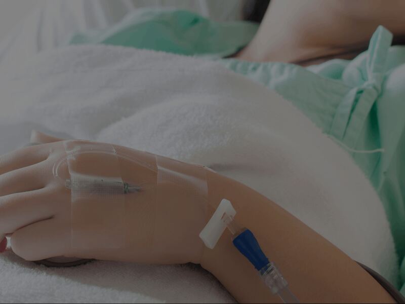 A patient resting in a hospital bed